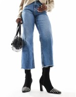 Rosie mid-heel sock boot in black with studded toe-cap