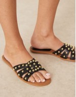 studded flat sandals in black