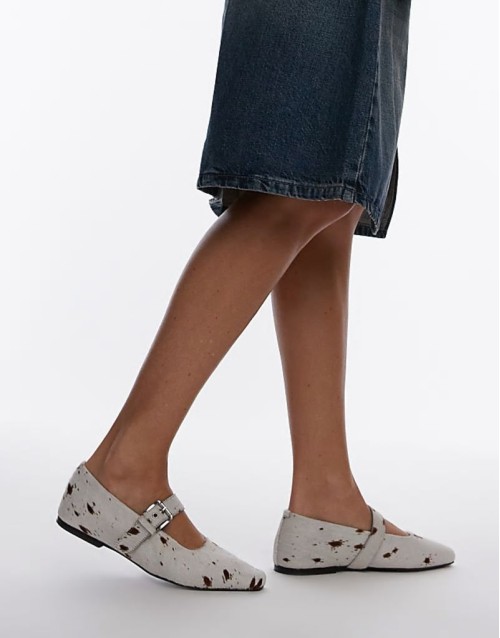 Cyndi leather square toe ballet flats with buckle detail in cow print pony