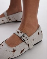 Cyndi leather square toe ballet flats with buckle detail in cow print pony