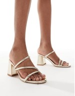 strappy block heeled slip on sandals in gold